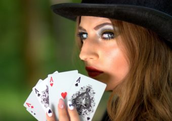 a lady with playing cards